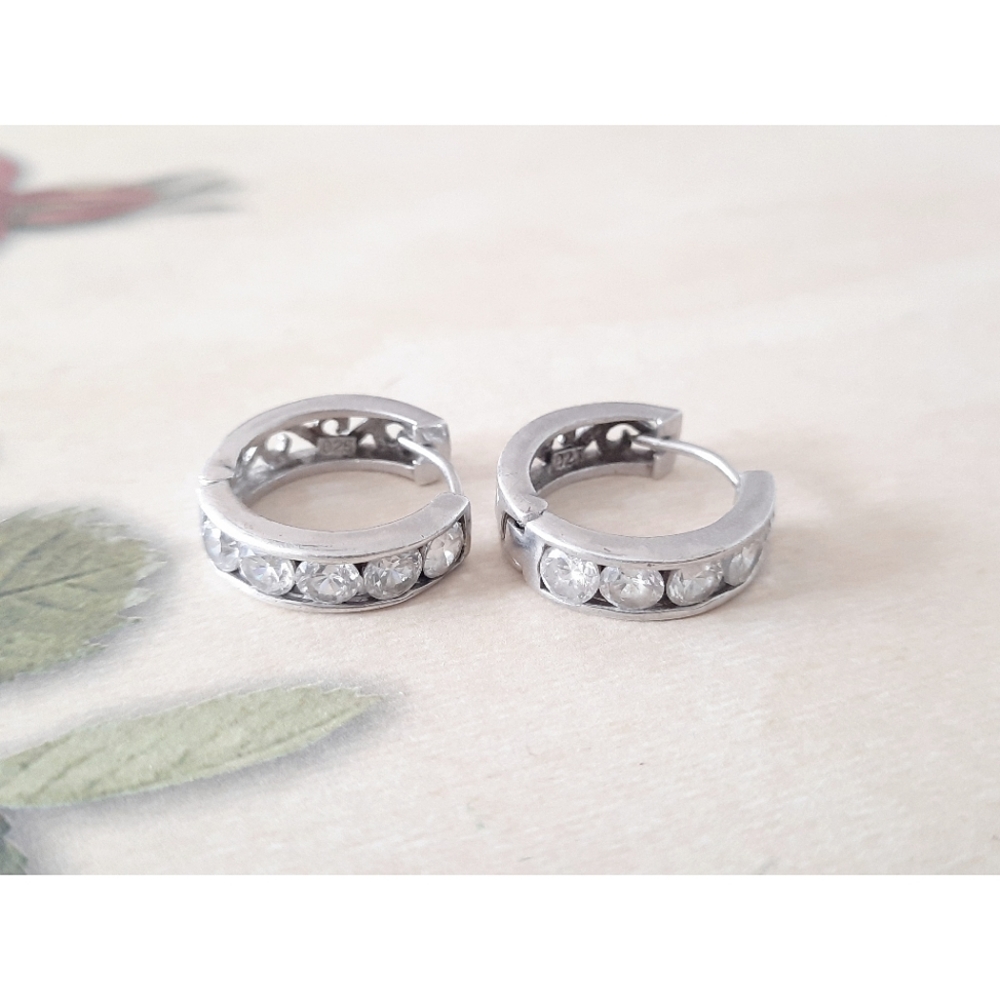 Sterling Zirconia and Fiagero hoop earrings.